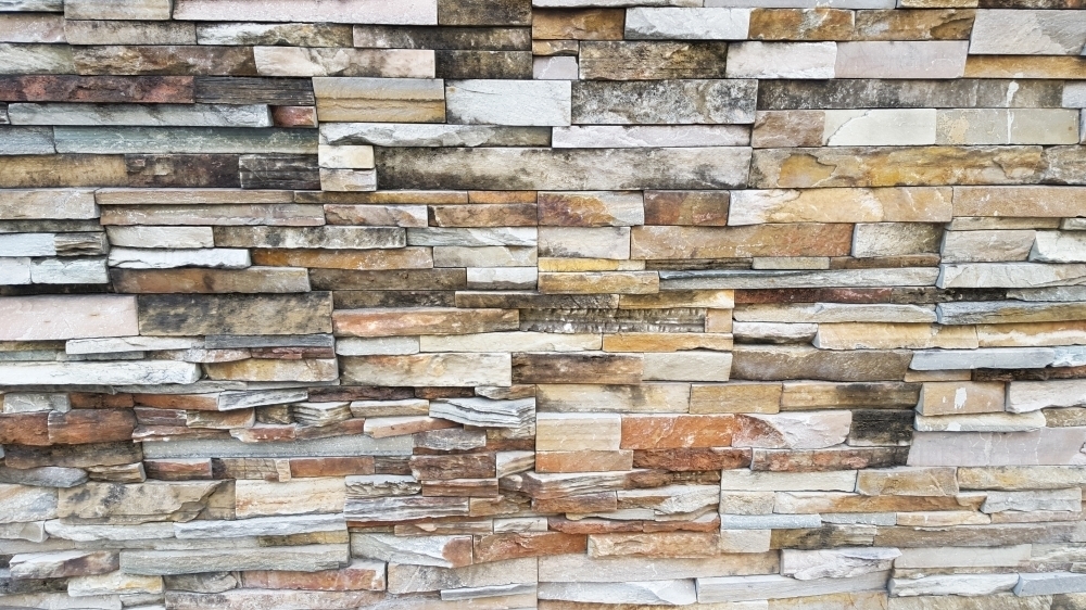 Textured stone wall - Australian Stock Image