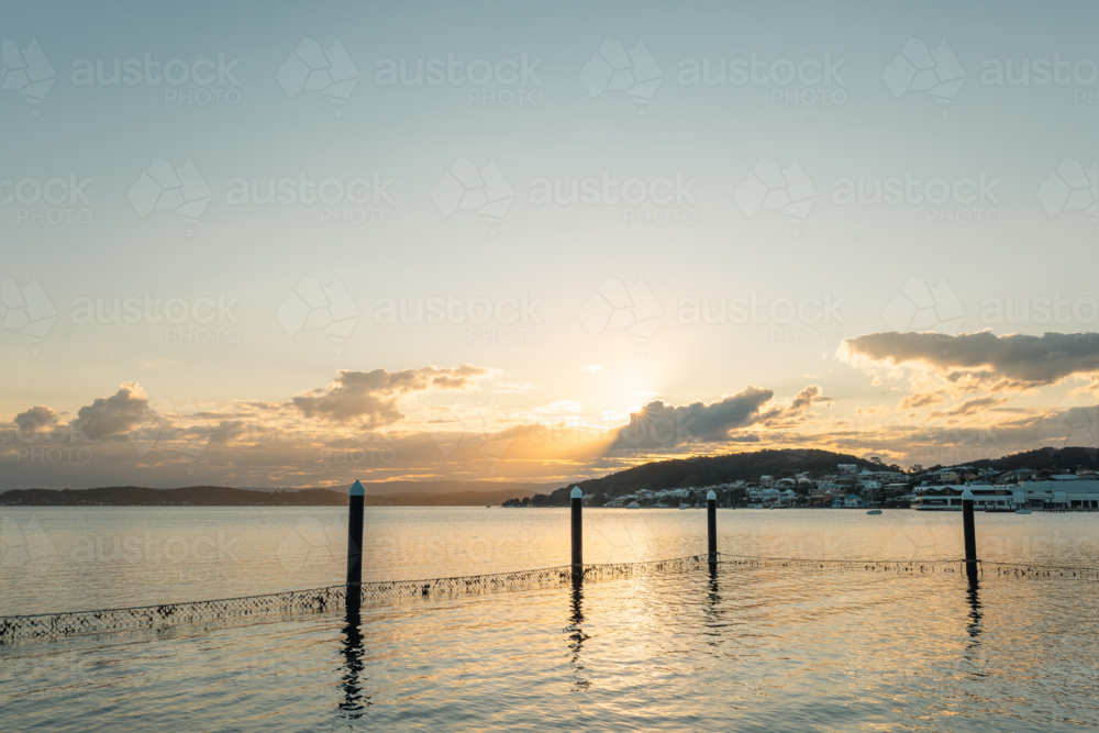 The Belmont Baths at Lake Macquarie at sunset - Australian Stock Image