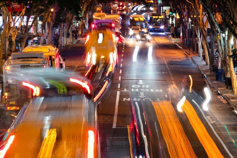 The busy movement of buses and traffic during peak hour along Adelaide Street at peak hour - Australian Stock Image