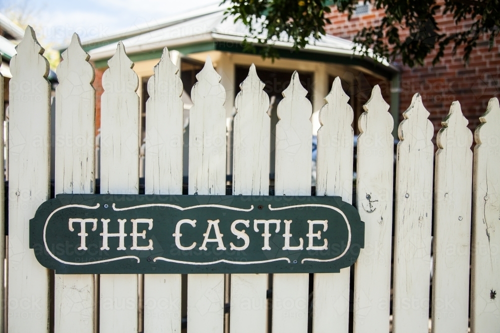 The Castle sign on a white fence - Australian Stock Image