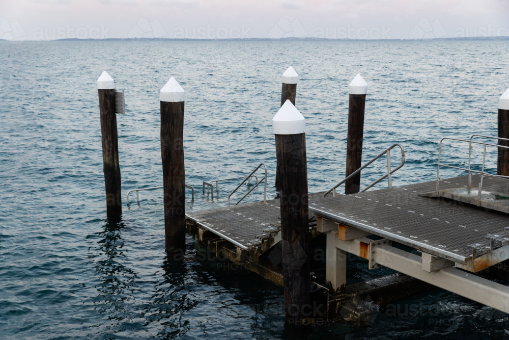 the end of a jetty underwater just before dawn - Australian Stock Image