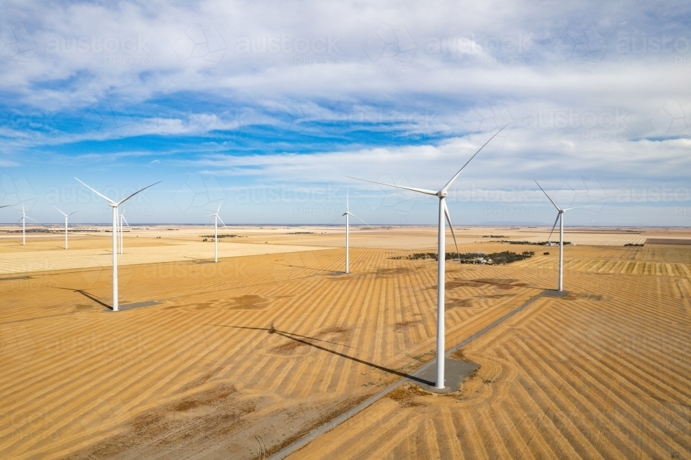 The expanse of wind turbines in a remote wind farm - Australian Stock Image