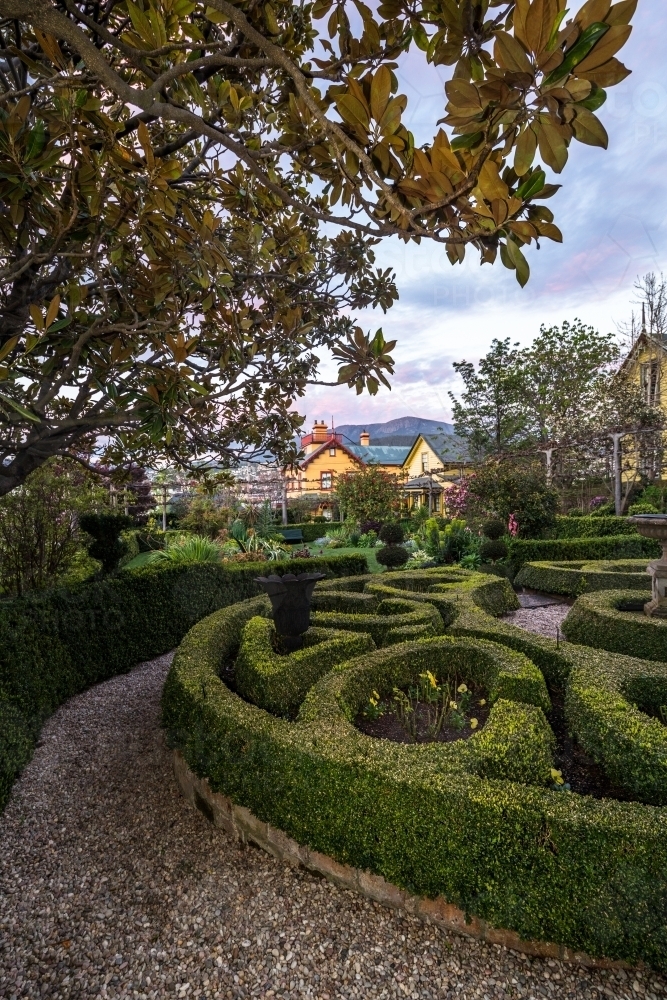 The gardens and hedges of the historic Corinda accommodation in Hobart - Australian Stock Image