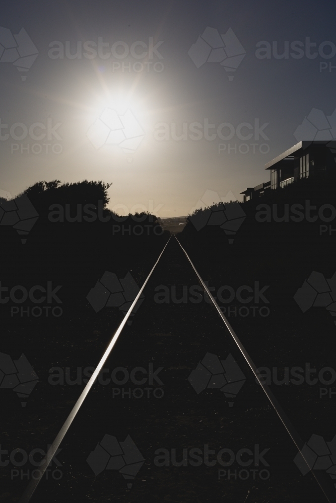 The glow of the train track and its leading lines - Australian Stock Image