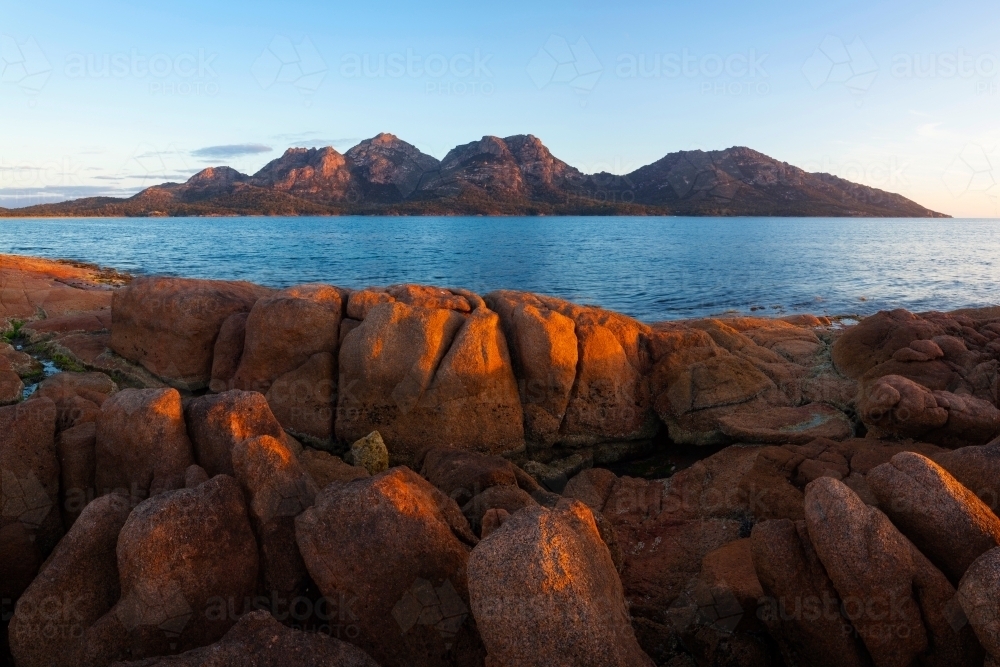 The Hazards viewed from Coles Bay - Freycinet National Park - Tasmania - Australian Stock Image