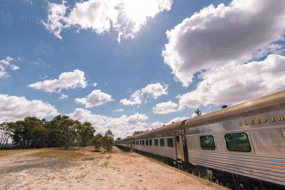 The iconic 'Southern Aurora' passenger train stopped at remote Ben Bullen Station - Australian Stock Image