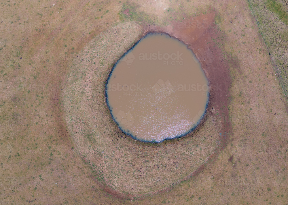 The last dam on a drought hit property in western New South Wales - Australian Stock Image