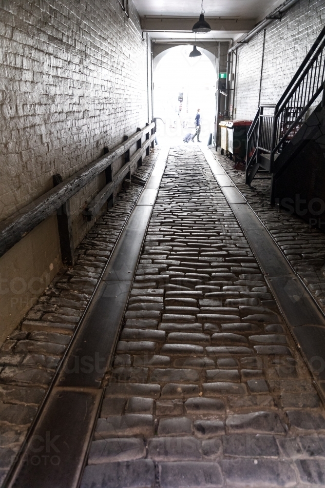 The light at the end of the cobblestone lane way in the heart of Sydney CBD - Australian Stock Image