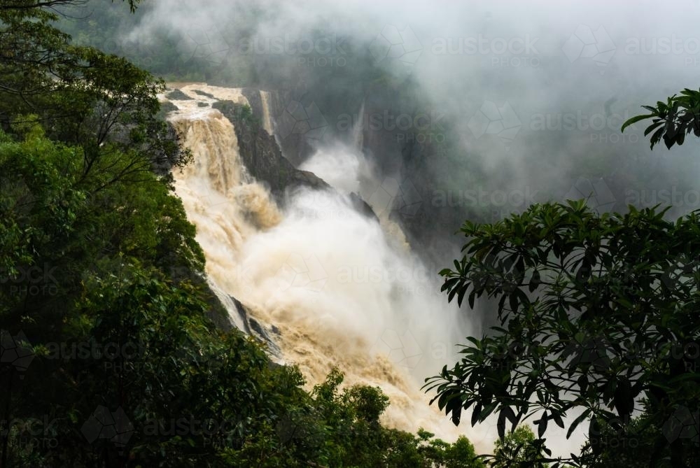 The mighty Barron Falls after heavy rain in far north Queensland - Australian Stock Image