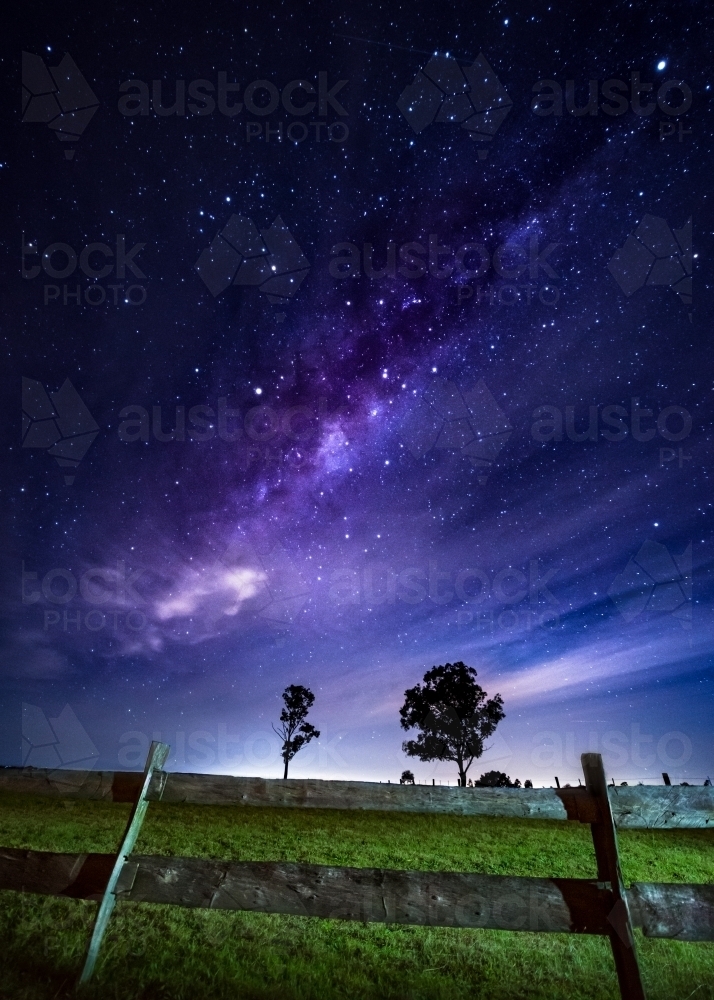 The milky way core over a farm - Australian Stock Image