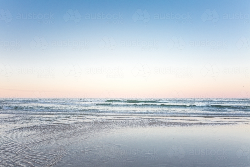 The ocean and waves at sunset - Australian Stock Image