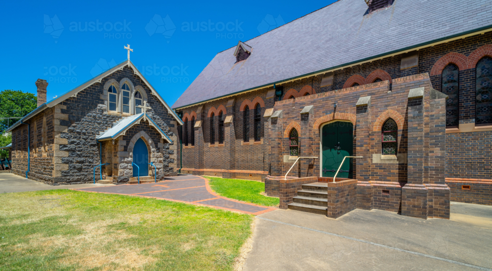 The old and new St Patrick's Catholic Church in Glen Innes, NSW - Australian Stock Image