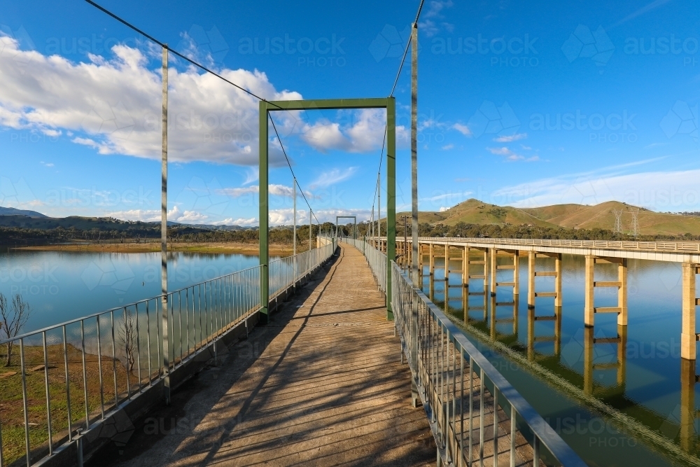 The Rail Trail bridge crossing over Lake Eildon from Bonnie Doon in Victoria - Australian Stock Image