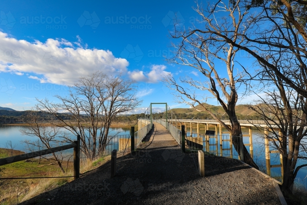 The Rail Trail bridge crossing over Lake Eildon from Bonnie Doon in Victoria - Australian Stock Image