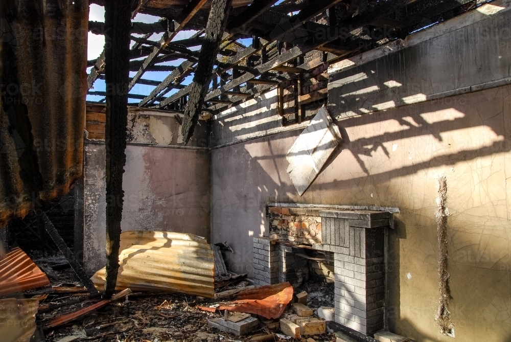 The remains of house fire in regional Victoria - Australian Stock Image