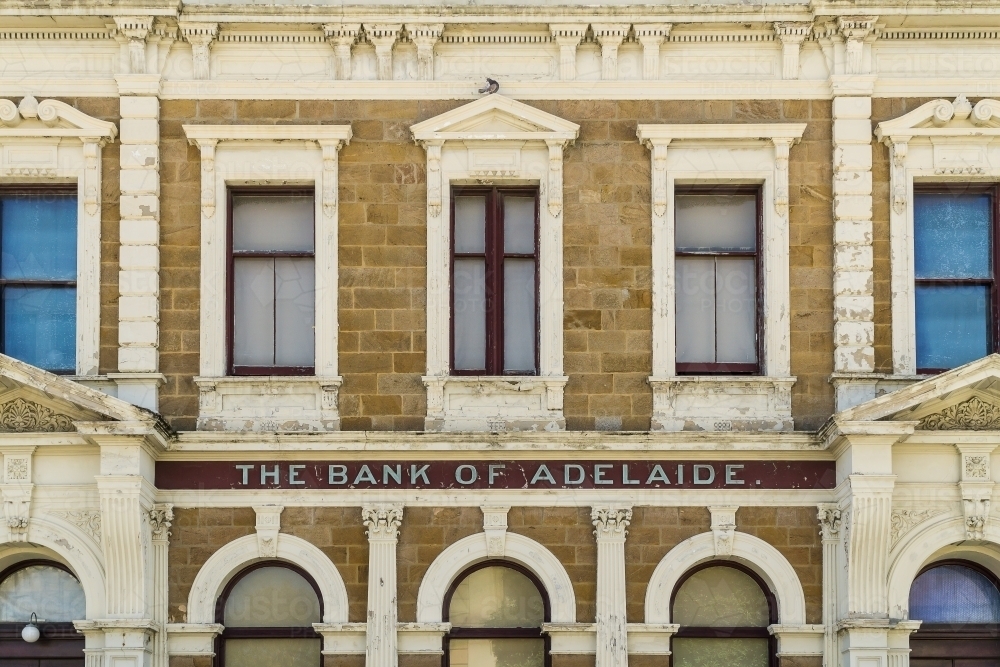 The sandstone facade of the historic bank of Adelaide building in Port Adelaide - Australian Stock Image