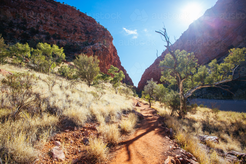 The Simpsons Gap and its red rock formations in MacDonnell Ranges National Park - Australian Stock Image