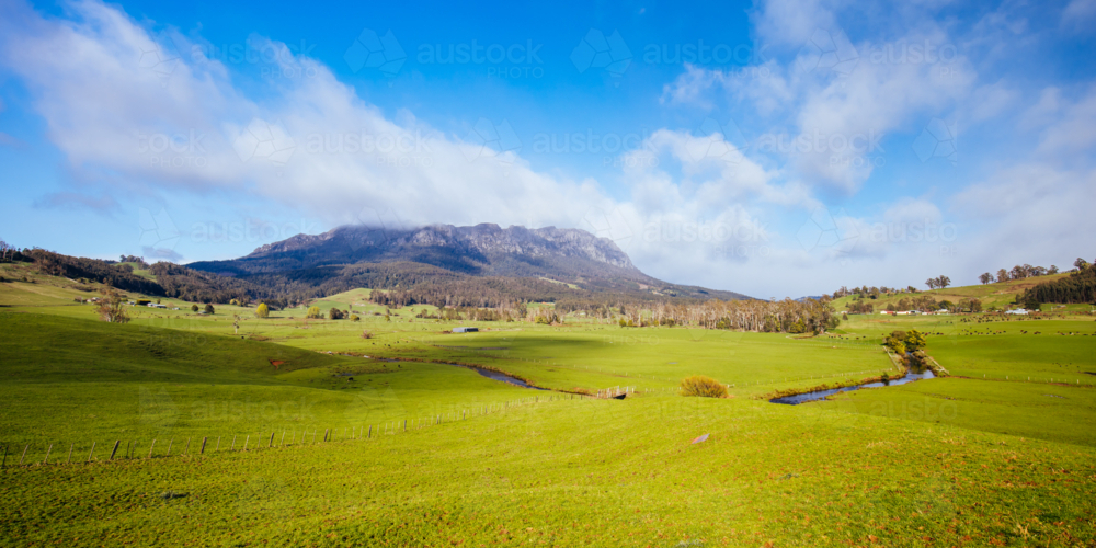 The stunning Mt Roland in central Tasmania on cool sunny spring day near the town of Sheffield - Australian Stock Image