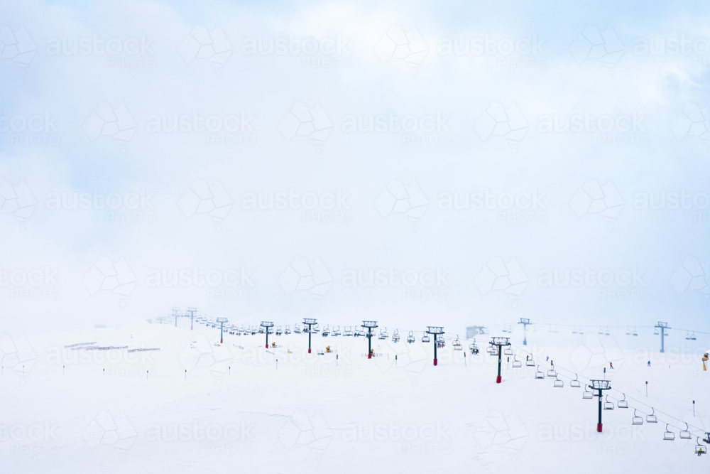 The Summit ski lift at Mt Hotham in foggy conditions - Australian Stock Image