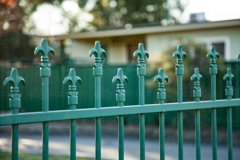 The top of a green school fence - Australian Stock Image