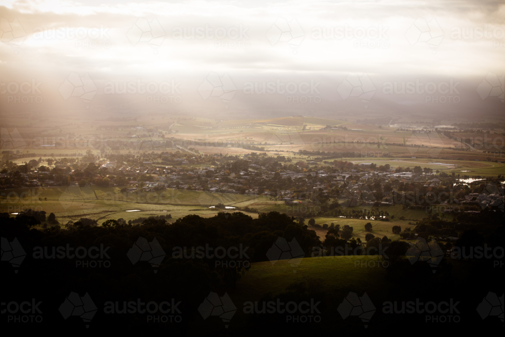 The view over Yarra Glen on a cool foggy autumn morning in Victoria, Australia - Australian Stock Image