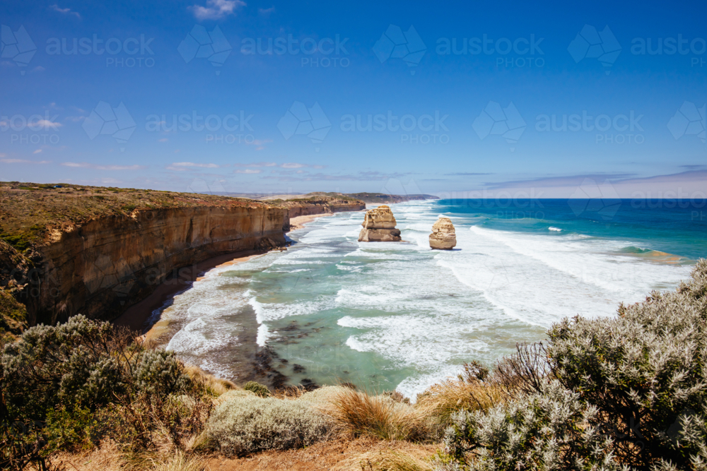 The world famous 12 Apostles on a bright sunny day along the Great Ocean Rd near Port Campbell - Australian Stock Image