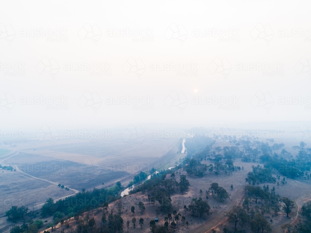Image of Thick smoke haze over farmland in hunter valley from bushfires ...