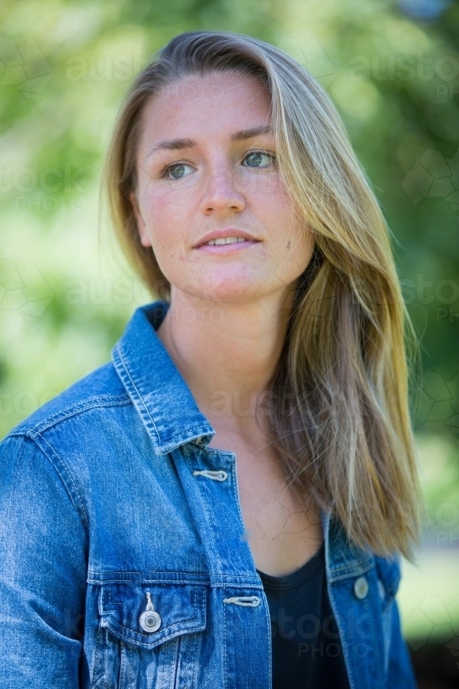 Thoughtful Young Woman in the Park - Australian Stock Image
