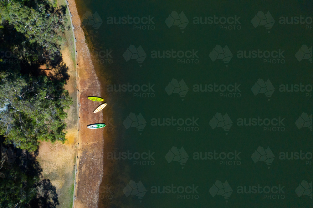 Three kayaks on the shore - Australian Stock Image