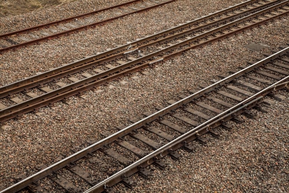 Three train tracks and gravel - Australian Stock Image
