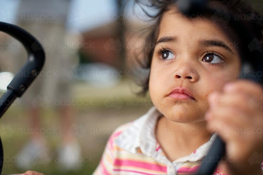 Three Year Old Aboriginal Girl Outdoors - Australian Stock Image