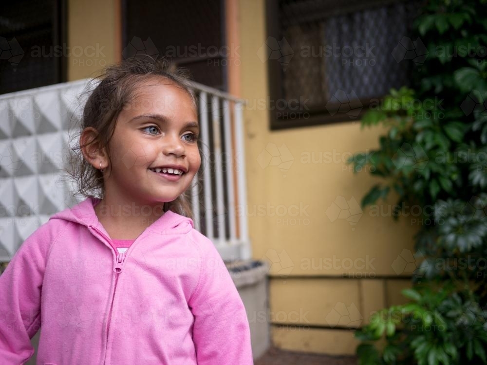Three Year Old Aboriginal Girl Outside Smiling - Australian Stock Image