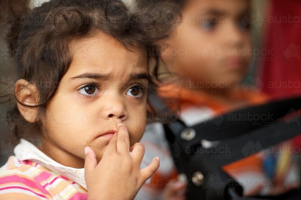 Three year old Aboriginal Girl with Concerned Expression - Australian Stock Image