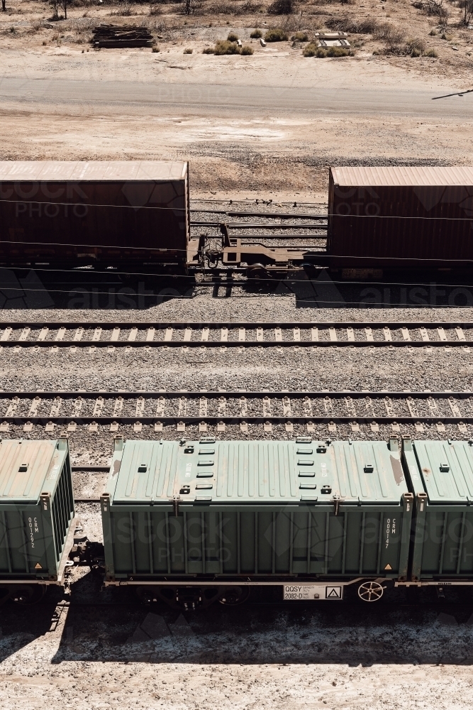 tightly cropped train carriages on train line - Australian Stock Image