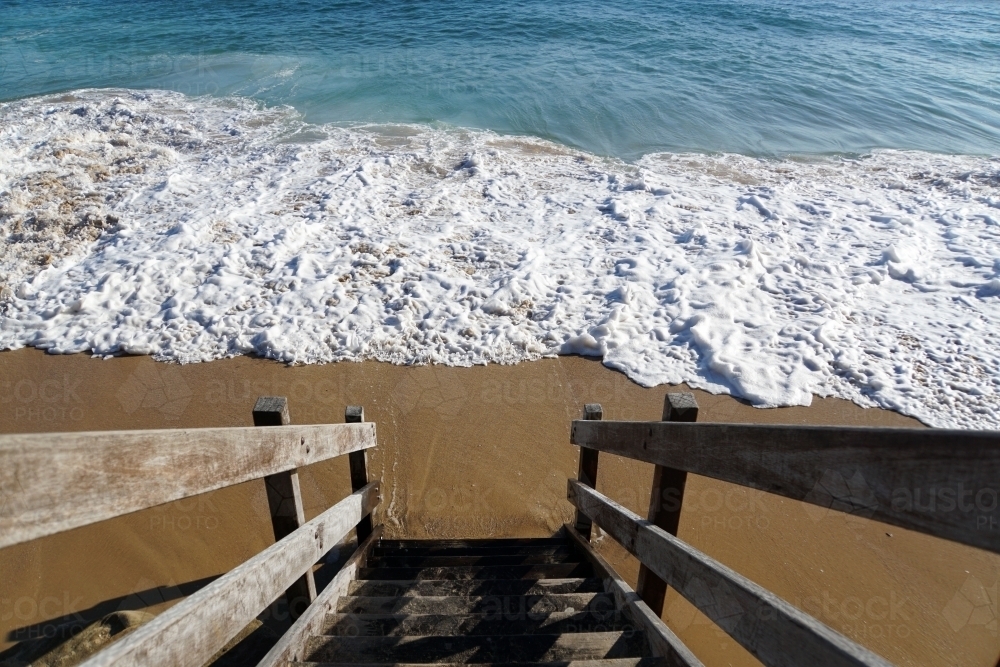 Timber steps down to the beach - Australian Stock Image