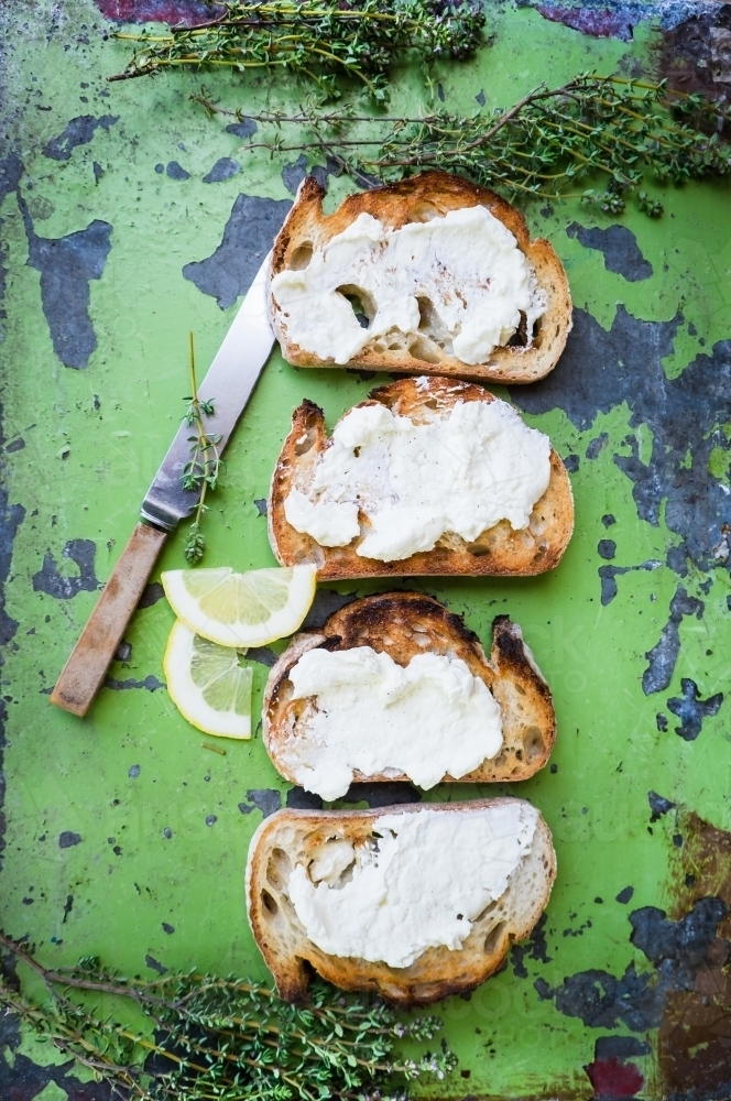 Toast and cheese spread with herbs - Australian Stock Image