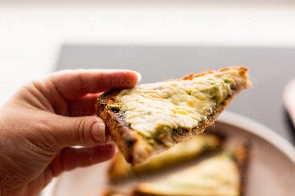 toast with grilled cheese, avocado and vegemite - Australian Stock Image