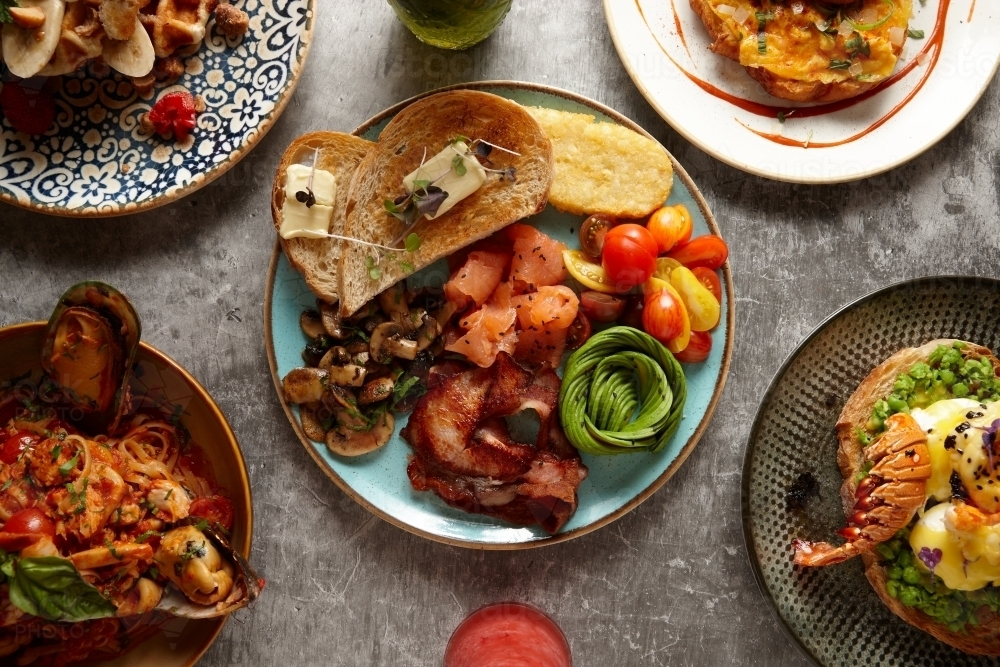 Image of Top down of appetising dishes on table - Austockphoto