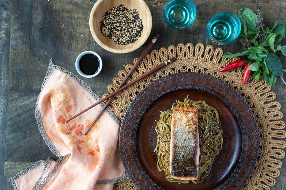 Top down of Asian salmon and noodle dish - Australian Stock Image