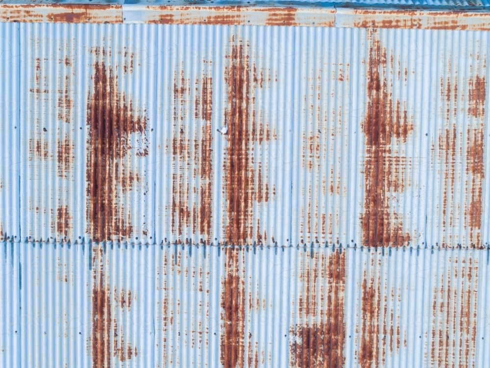 Top down of rusty roof texture of corrugated iron metal - Australian Stock Image