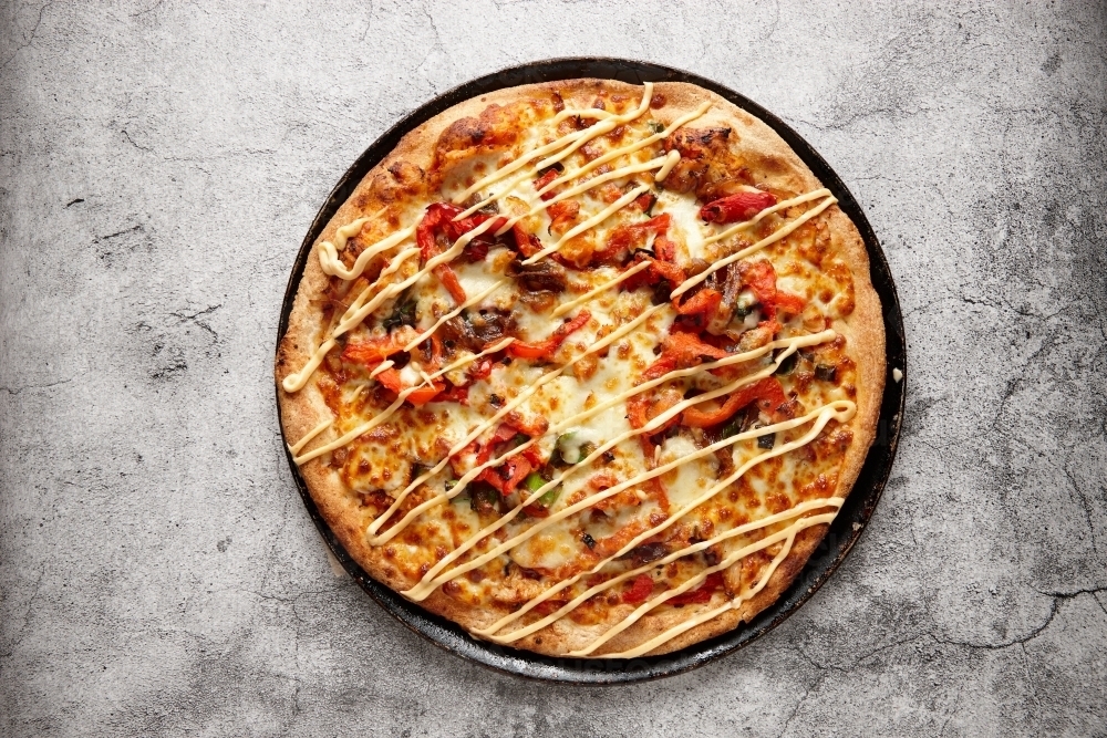 top shot of a mona peri peri pizza - Australian Stock Image