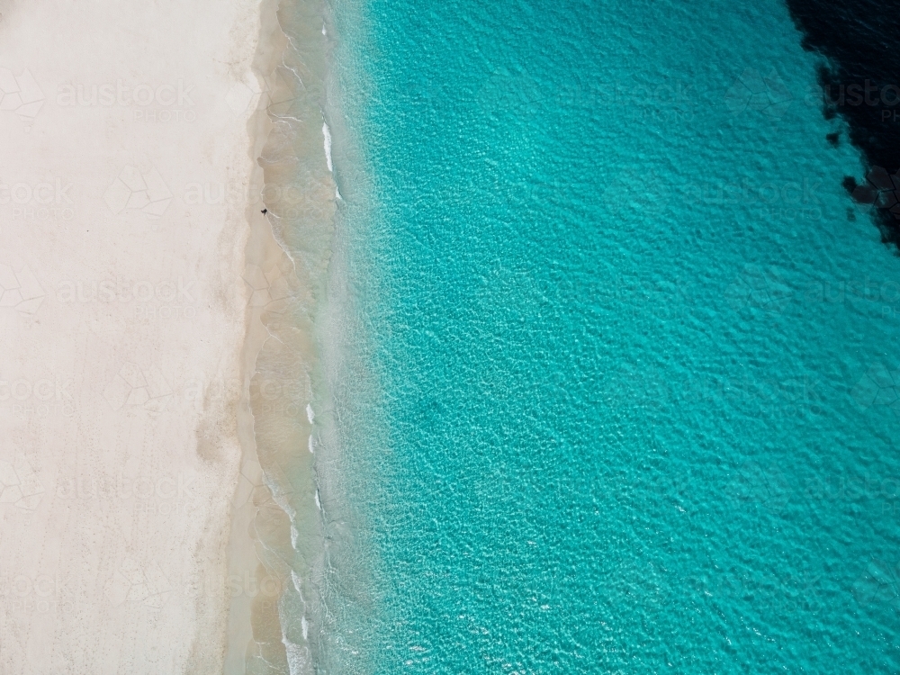 top shot of a white sand beach on a sunny day - Australian Stock Image