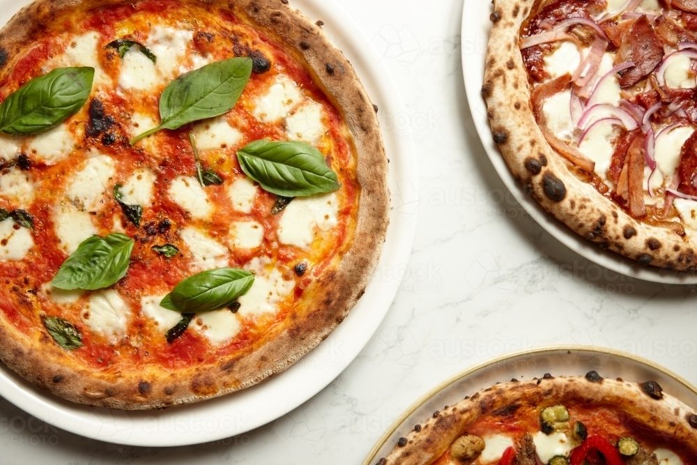 Top shot of new york style pizza : Austockphoto Top shot of new york style pizza - Australian Stock Image