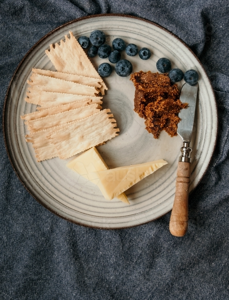 Top view of a blueberry and cheese platter - Australian Stock Image