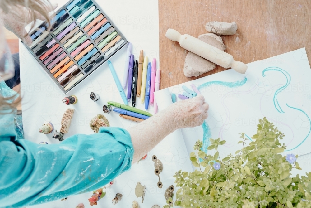 Top view of women with art materials - Australian Stock Image