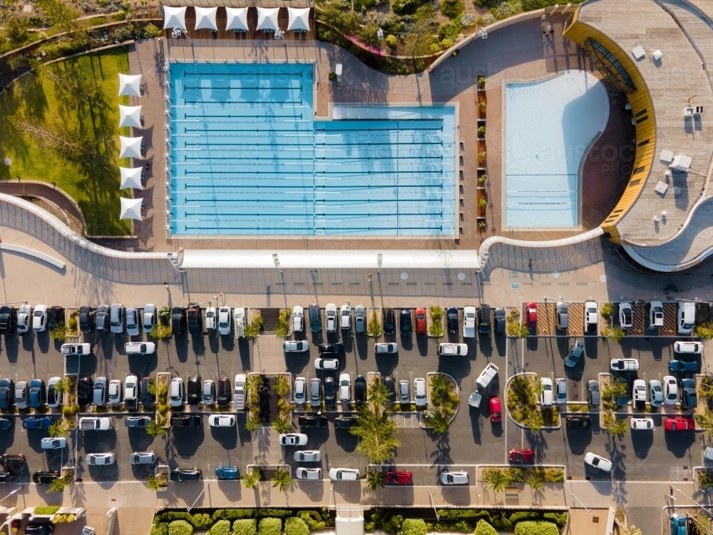 Image Of Top View Shot Of Two Swimming Pools With White Shade In The image-of-top-view-shot-of-two-swimming-pools-with-white-shade-in-the