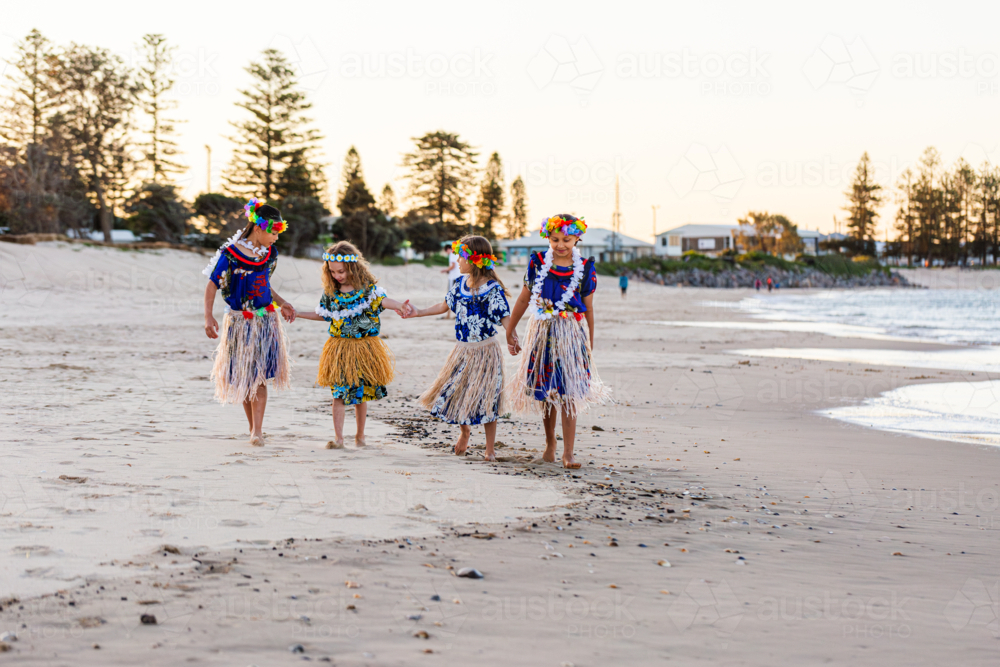 Torres Strait Islander dancer performer children in traditional floral dresses and flower garlands - Australian Stock Image