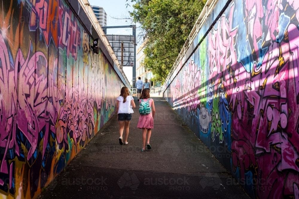 tourist family walking the streets of Melbourne - Australian Stock Image