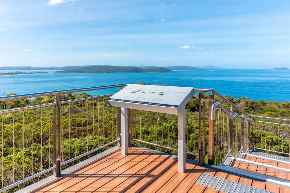 Tourist lookout overlooking blue seascape - Australian Stock Image