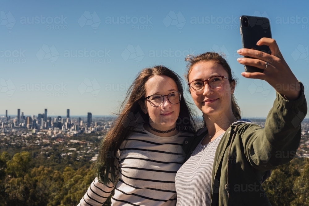 tourists taking selfie - Australian Stock Image